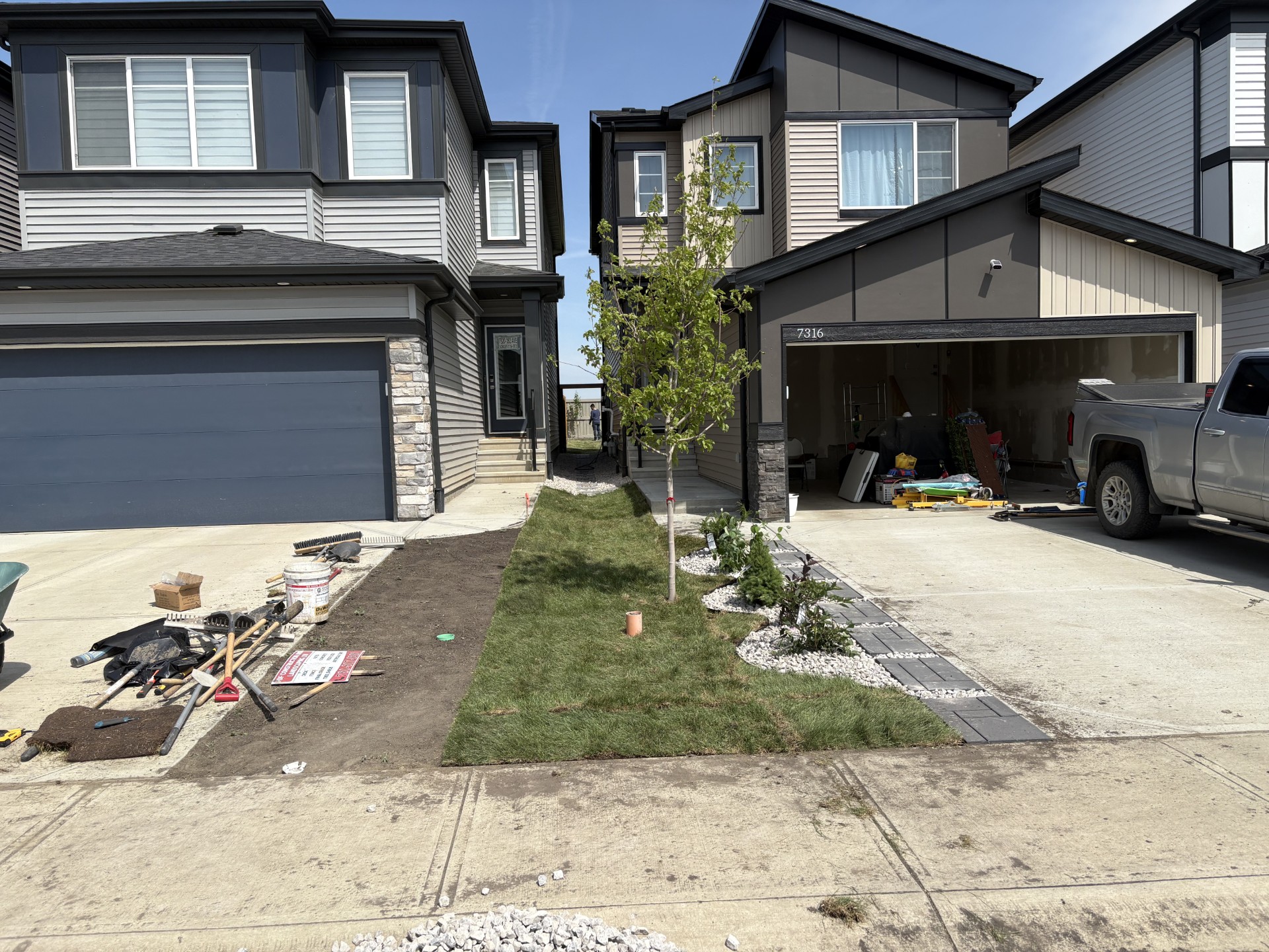 Tree, sod, and stone landscaping project in Edmonton