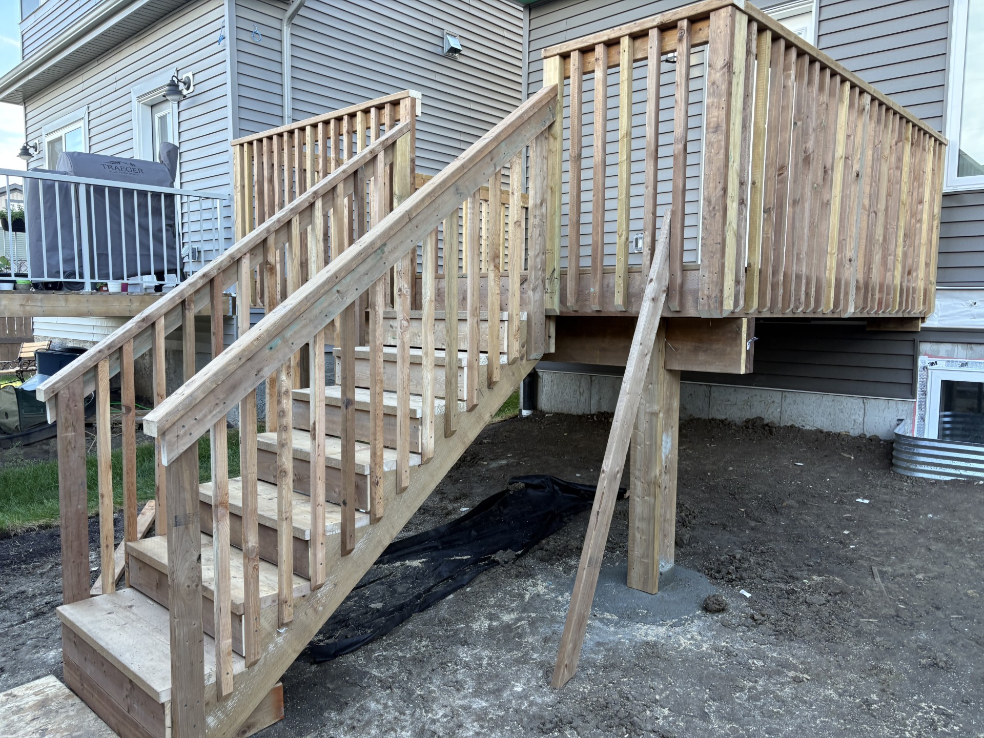Pressure treated wood deck construction in Edmonton